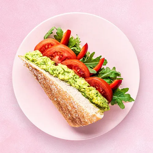 Sandwich Vegan with avocado, tomato, bell pepper, rocket
