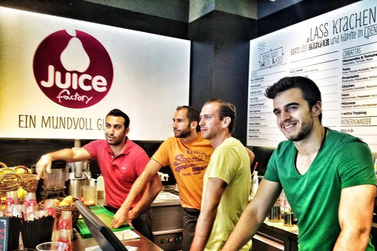 Four Juicers behind the counter at Juice Factory