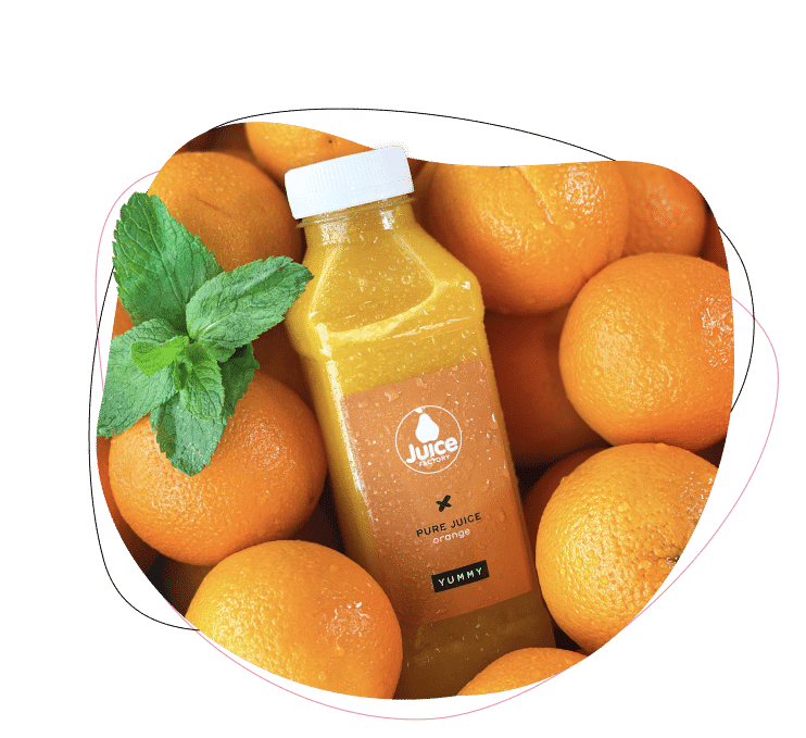 A bottle of orange juice labeled Pure Juice sits among fresh oranges with a sprig of mint, emphasizing freshness and natural ingredients.